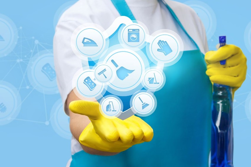 Cleaner wearing protective equipment in an office